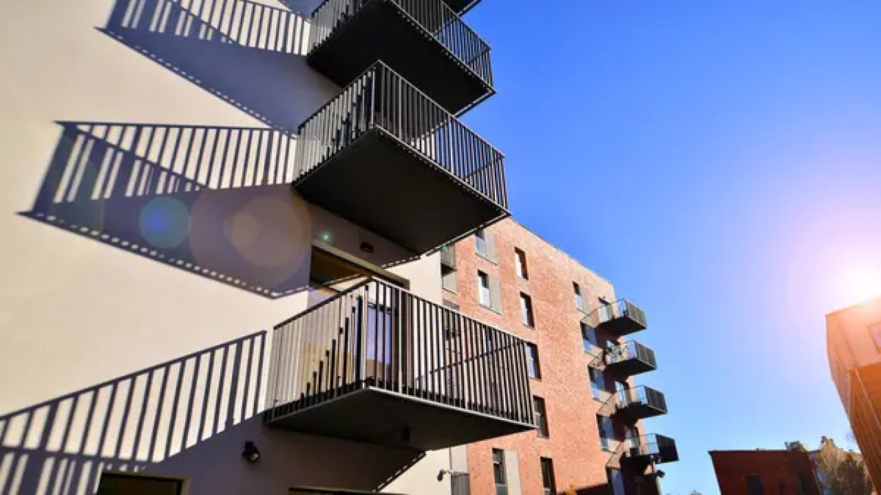 depositphotos-759062222-stock-photo-modern-multifamily-building-european-city.jpg